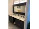 Double vanity bathroom with large mirror and updated fixtures at 272 Leisure World --, Mesa, AZ 85206