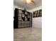 Spacious bedroom with tile floors and built-in shelving unit at 272 Leisure World --, Mesa, AZ 85206