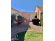 Small backyard with gravel and a hanging chair at 272 Leisure World --, Mesa, AZ 85206