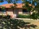 Cute one-story home with a covered entry and well-manicured lawn at 272 Leisure World --, Mesa, AZ 85206