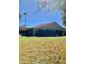 Spacious backyard with grassy area and a grill at 272 Leisure World --, Mesa, AZ 85206