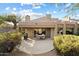 Covered patio with seating area and built-in grill at 9220 E Whitethorn Cir, Scottsdale, AZ 85266