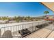 Balcony view of the community, parking lot, and distant mountains at 16510 E Palisades Blvd # 13, Fountain Hills, AZ 85268