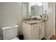 Bathroom with granite countertop and white cabinets at 2025 E Campbell Ave # 330, Phoenix, AZ 85016