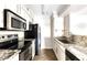 Kitchen with granite countertops and stainless steel appliances at 2025 E Campbell Ave # 330, Phoenix, AZ 85016