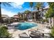 Inviting community pool with surrounding lounge chairs at 2025 E Campbell Ave # 330, Phoenix, AZ 85016