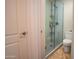 Bright bathroom with a toilet and a walk-in shower at 2025 E Campbell Ave # 330, Phoenix, AZ 85016