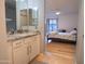 Bathroom with granite countertop and white cabinets at 2025 E Campbell Ave # 330, Phoenix, AZ 85016