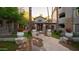 Attractive building exterior with a walkway and stone accents at 2025 E Campbell Ave # 330, Phoenix, AZ 85016