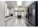 Well-equipped kitchen with white cabinets and black appliances at 8333 W Wescott Dr, Peoria, AZ 85382