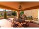 Covered patio with seating area, perfect for outdoor dining at 8333 W Wescott Dr, Peoria, AZ 85382