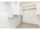 Large walk-in closet with double hanging rods and shelving at 8333 W Wescott Dr, Peoria, AZ 85382