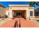 Covered patio with tile flooring, seating area, and built-in grill at 8333 W Wescott Dr, Peoria, AZ 85382