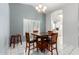 Casual dining area with square table and four chairs at 8333 W Wescott Dr, Peoria, AZ 85382