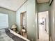 Cozy bedroom with ensuite bathroom and view of living area at 225 S Motherlode Dr, Apache Junction, AZ 85119