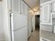 Gray cabinets and a refrigerator highlight this kitchen at 225 S Motherlode Dr, Apache Junction, AZ 85119