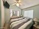 Spacious bedroom with large bed and built-in dresser at 225 S Motherlode Dr, Apache Junction, AZ 85119