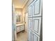 Bright bathroom with shower and storage at 225 S Motherlode Dr, Apache Junction, AZ 85119