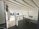 Covered patio with table and chairs, offering an outdoor entertaining space at 225 S Motherlode Dr, Apache Junction, AZ 85119