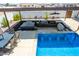 Enjoy this refreshing pool with swim-up bar and patio seating at 5604 S 225Th Ave, Buckeye, AZ 85326