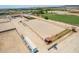 Aerial view showing property, arena, and surrounding area at 5604 S 225Th Ave, Buckeye, AZ 85326