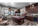 Game room with pool table, bar area, and rustic decor at 5604 S 225Th Ave, Buckeye, AZ 85326