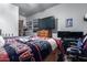 Spacious bedroom with large TV and ample closet space at 5604 S 225Th Ave, Buckeye, AZ 85326
