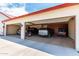 Attached three-car garage with automatic door openers at 5604 S 225Th Ave, Buckeye, AZ 85326