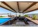Relaxing pool area with hot tub and outdoor bar at 5604 S 225Th Ave, Buckeye, AZ 85326