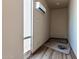 Unfinished storage room with floor rug and dog bowl at 5604 S 225Th Ave, Buckeye, AZ 85326