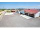 Property features a detached two-car garage and basketball court at 5604 S 225Th Ave, Buckeye, AZ 85326