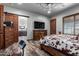 Bedroom with ensuite bathroom and barn door at 5604 S 225Th Ave, Buckeye, AZ 85326