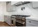 Sleek kitchen design with professional gas range and modern fixtures at 25219 S 194Th St, Queen Creek, AZ 85142