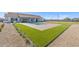 Inviting pool area with artificial turf and spacious patio at 25219 S 194Th St, Queen Creek, AZ 85142
