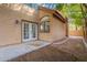 Small back patio adjacent to the house, with double doors leading inside at 4662 W Ivanhoe St, Chandler, AZ 85226