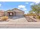 Charming single-story home with a two-car garage and well-manicured landscaping at 4657 E Matt Dillon Trl, Cave Creek, AZ 85331