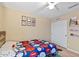 Bright bedroom with double doors and sports theme at 4657 E Matt Dillon Trl, Cave Creek, AZ 85331