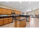 Spacious kitchen with island, stainless steel appliances, and ample cabinetry at 4657 E Matt Dillon Trl, Cave Creek, AZ 85331