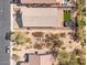 Aerial view showcasing the home's layout, backyard, and surrounding landscape at 4657 E Matt Dillon Trl, Cave Creek, AZ 85331