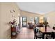 Bright and airy living room with tile floors, a dining area, and ample natural light at 4657 E Matt Dillon Trl, Cave Creek, AZ 85331
