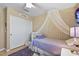 Light and airy bedroom with double doors and ceiling fan at 4657 E Matt Dillon Trl, Cave Creek, AZ 85331