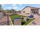 Large backyard with artificial turf and patio furniture at 4657 E Matt Dillon Trl, Cave Creek, AZ 85331