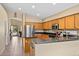 Open kitchen with stainless steel appliances and a breakfast bar at 4657 E Matt Dillon Trl, Cave Creek, AZ 85331