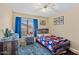 Spacious bedroom with wood-like floors and ceiling fan at 4657 E Matt Dillon Trl, Cave Creek, AZ 85331