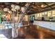 Rustic dining area with a copper-topped table at 2317 W Dobbins Rd, Phoenix, AZ 85041