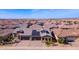 Aerial view of home with solar panels and community at 24884 N 171St Ln, Surprise, AZ 85387