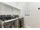 Laundry room with washer and dryer included at 24884 N 171St Ln, Surprise, AZ 85387