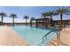 Community pool with lounge chairs and covered seating at 24884 N 171St Ln, Surprise, AZ 85387