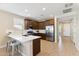 Modern kitchen with stainless steel appliances and an island at 24884 N 171St Ln, Surprise, AZ 85387