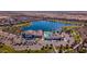 Community overview featuring lake and clubhouse at 24884 N 171St Ln, Surprise, AZ 85387